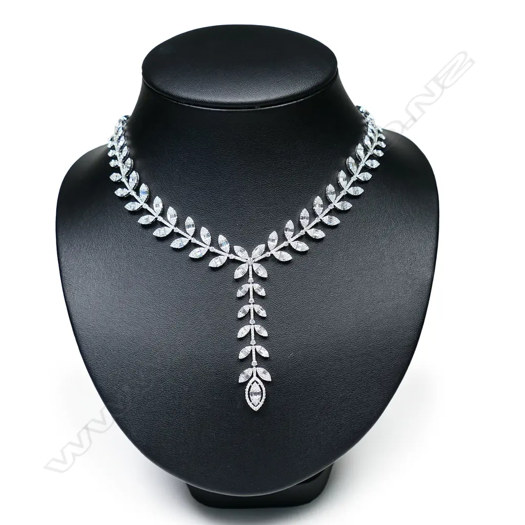 An 18ct white gold and multi diamond leafy vine design necklace, Image 1++