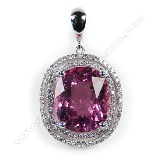An 18ct white gold pink tourmaline and diamond pendant,
