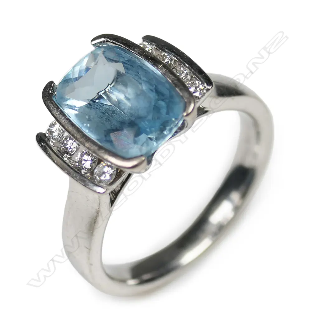 An 18ct white gold aquamarine and diamond dress ring, Image 1++