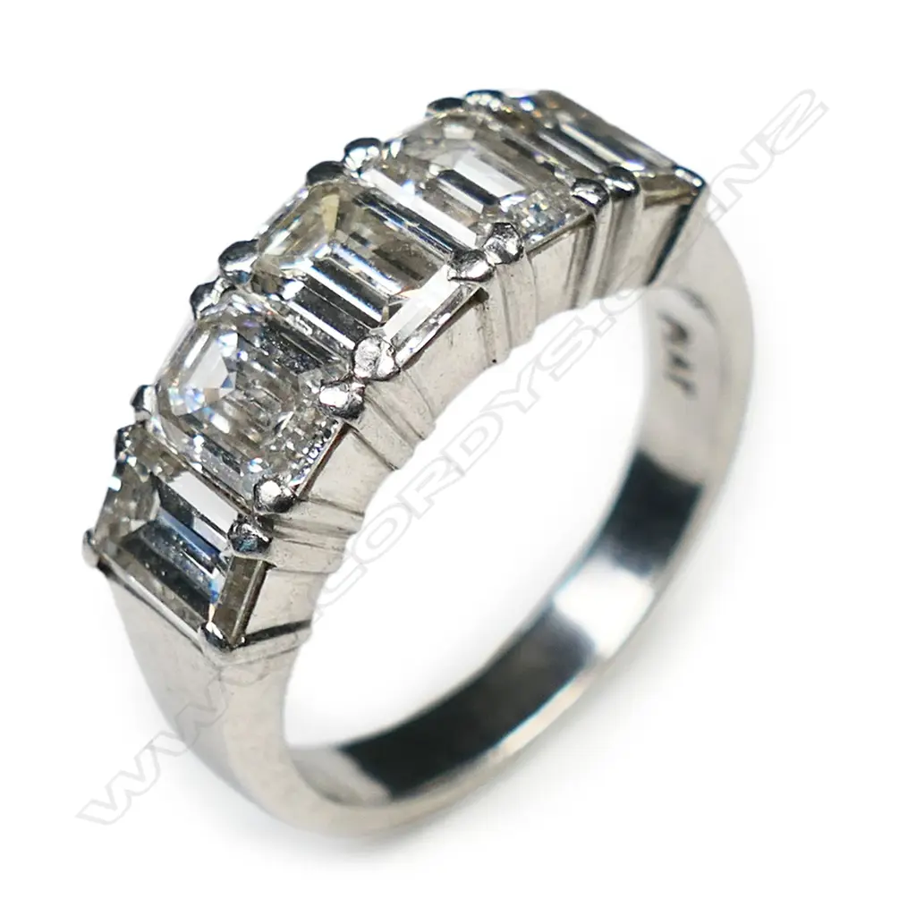 A platinum and five stone diamond ring, Image 1++