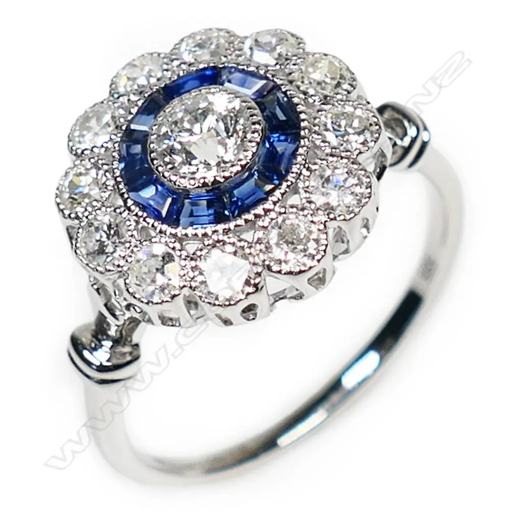 A 14ct white gold, sapphire and diamond halo ring, Image 1++
