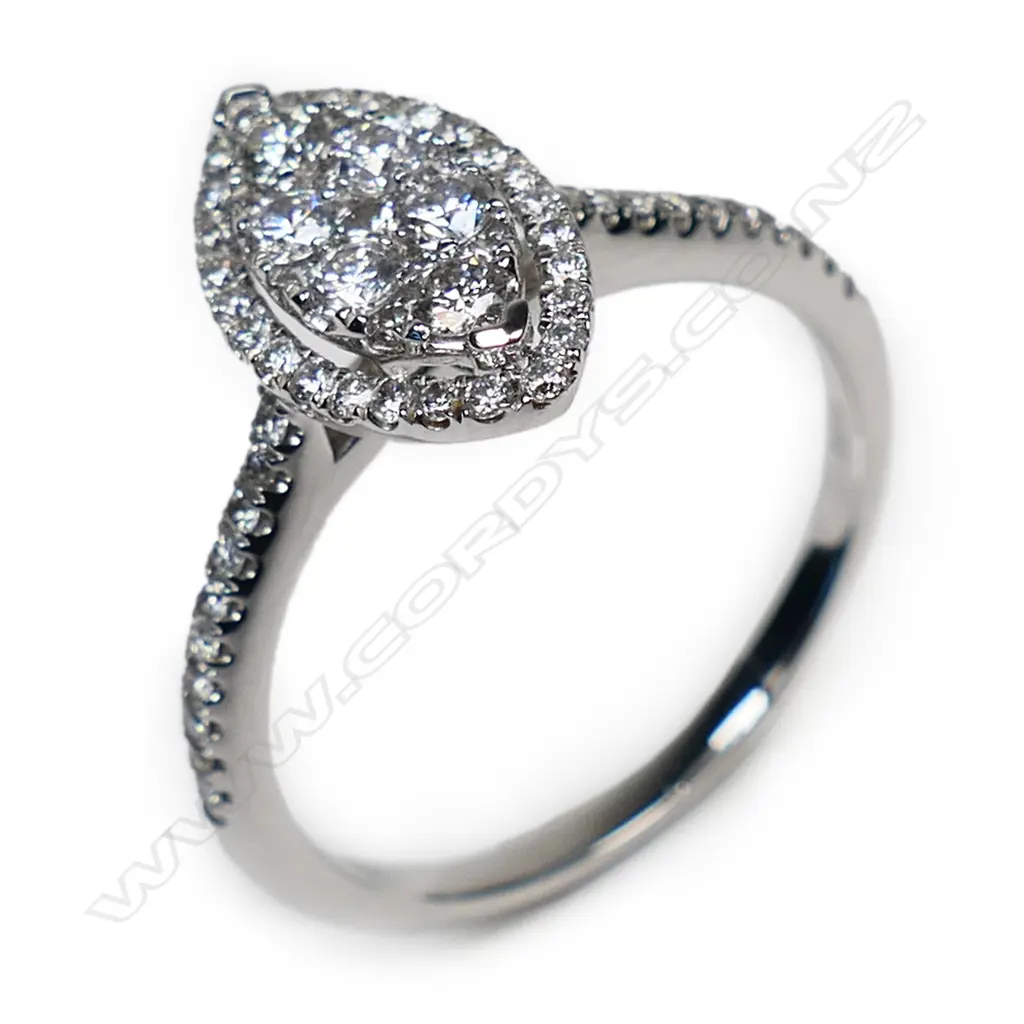 An 18ct white gold and diamond cluster ring, Image 1++