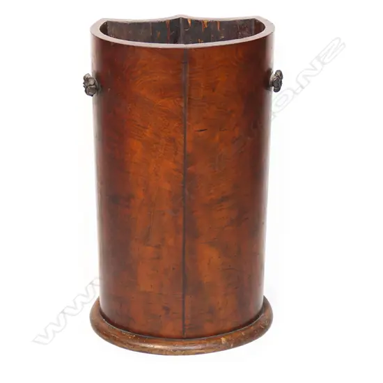 A Victorian flame mahogany stick stand,