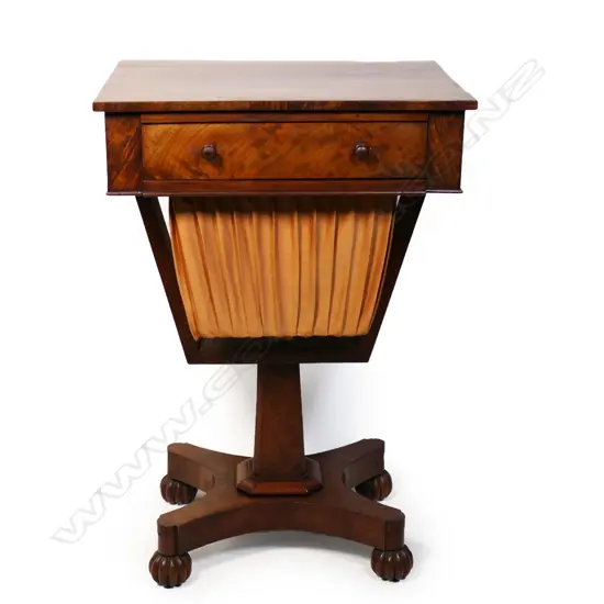 A Victorian flame mahogany work table,