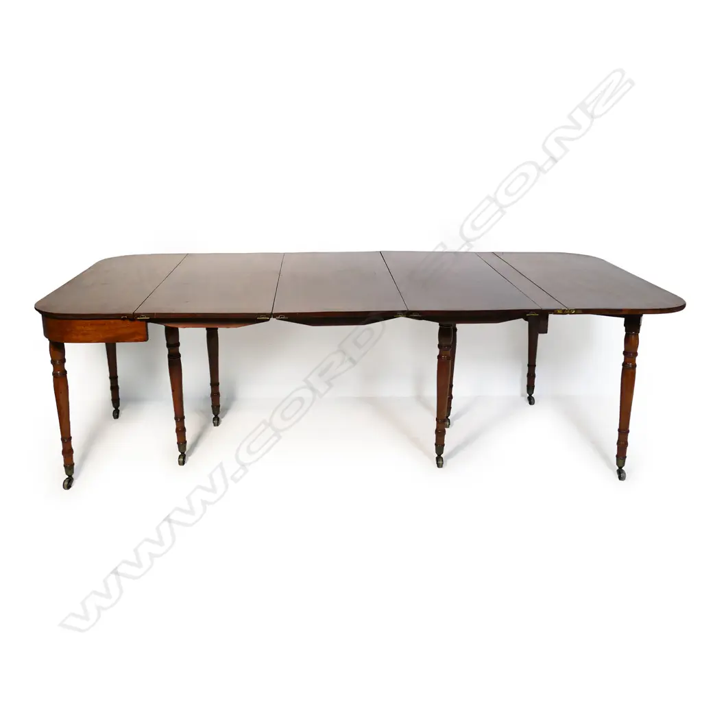 A D-end mahogany concertina action folding dining table, Image 1++