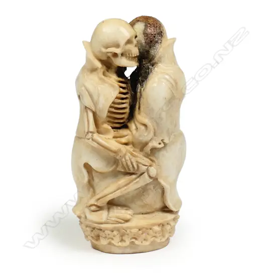 A vintage carved deer antler Memento Mori,