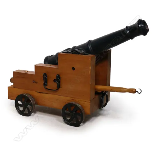 A cast iron 20thC model of a Victorian cannon,