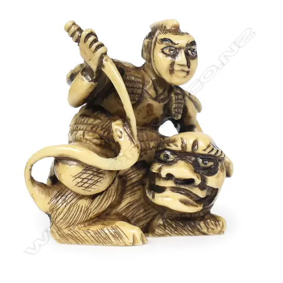 An ivory netsuke as a samurai,