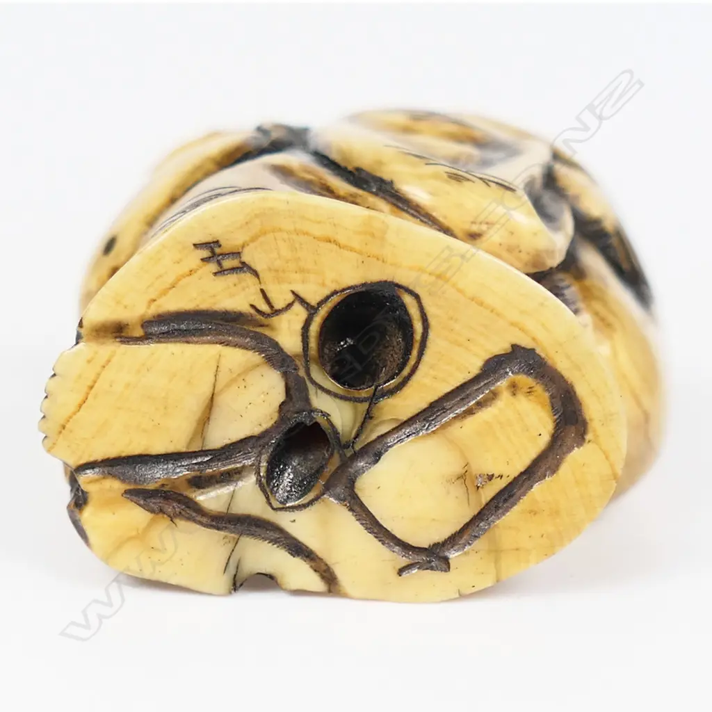 An ivory netsuke of Hotei, Image 1++