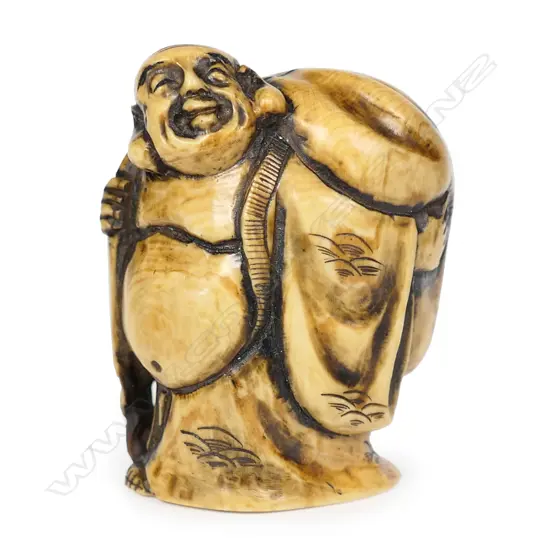 An ivory netsuke of Hotei,