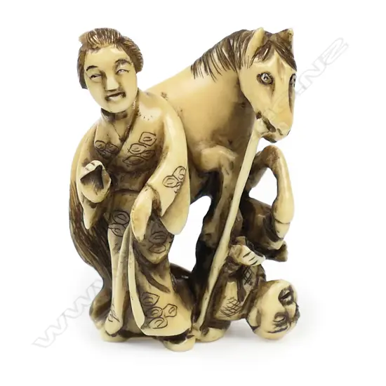 Ivory netsuke figure group,