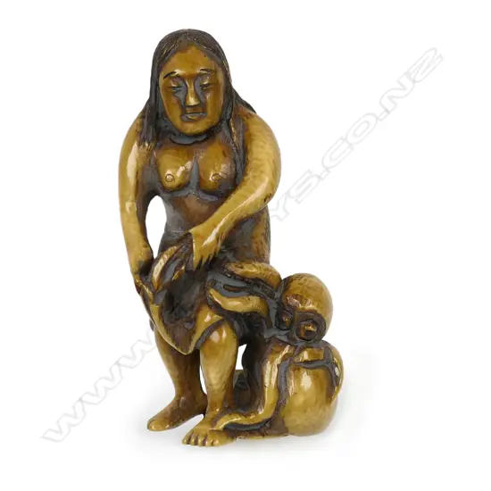 Ivory netsuke of a woman with octopus,