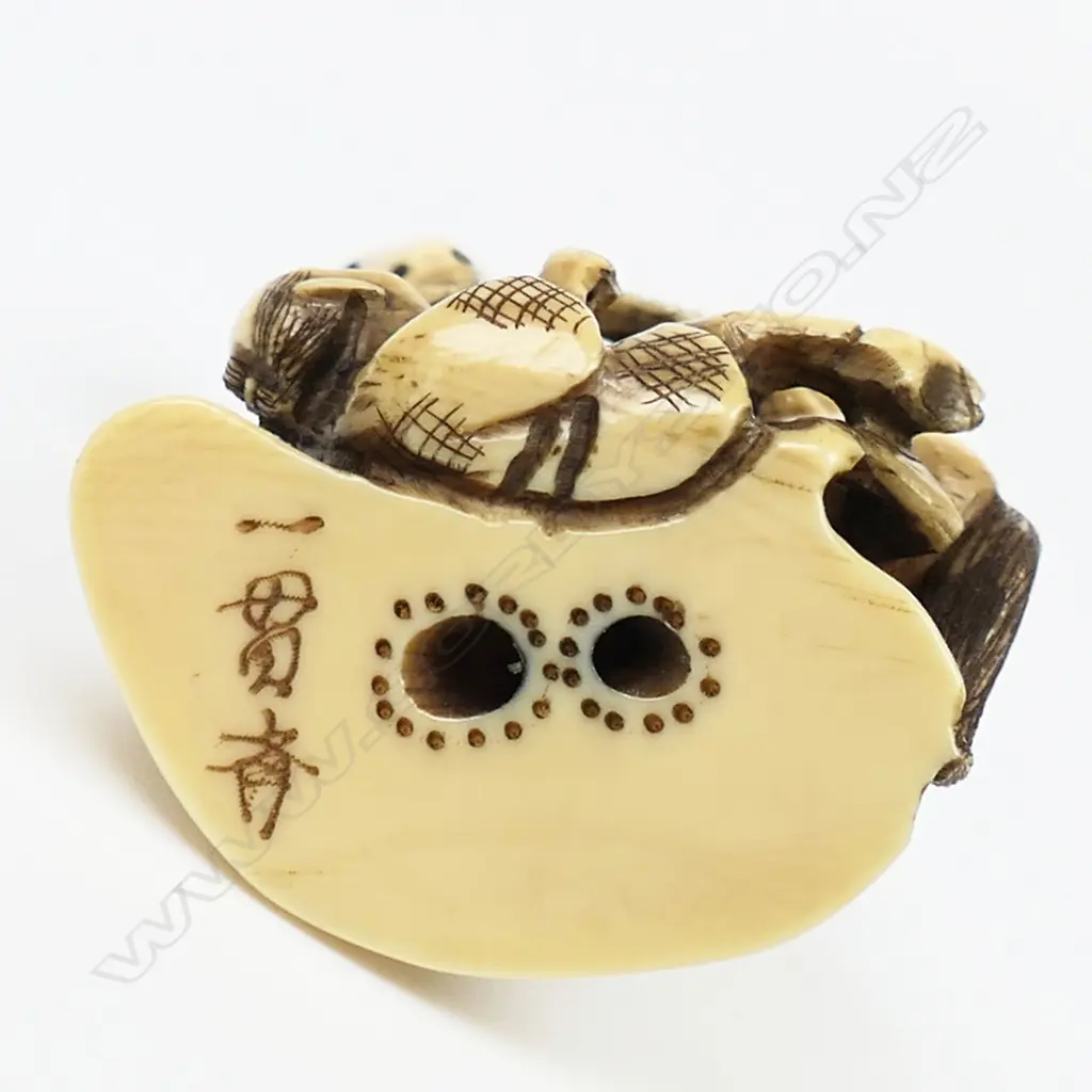 Ivory netsuke of two men battling with a horse, Image 1++