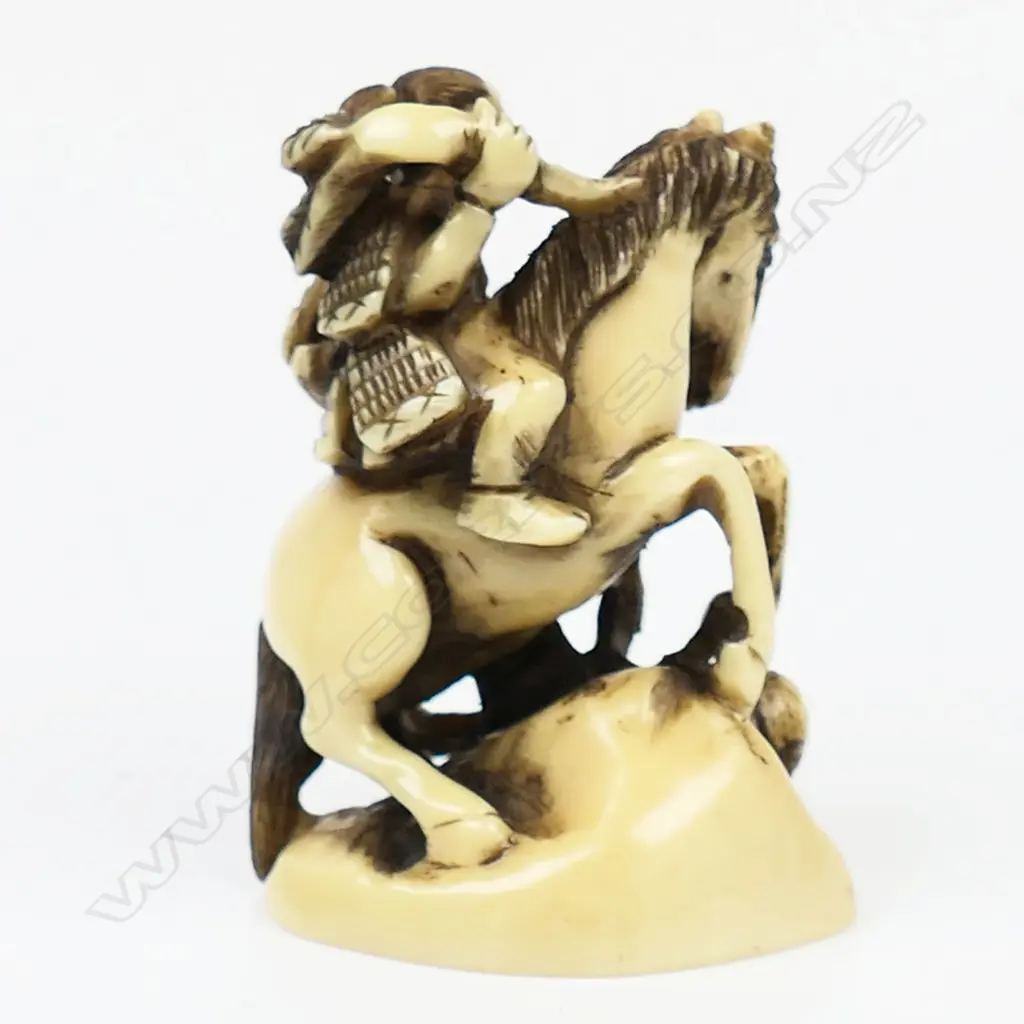 Ivory netsuke of two men battling with a horse, Image 1++