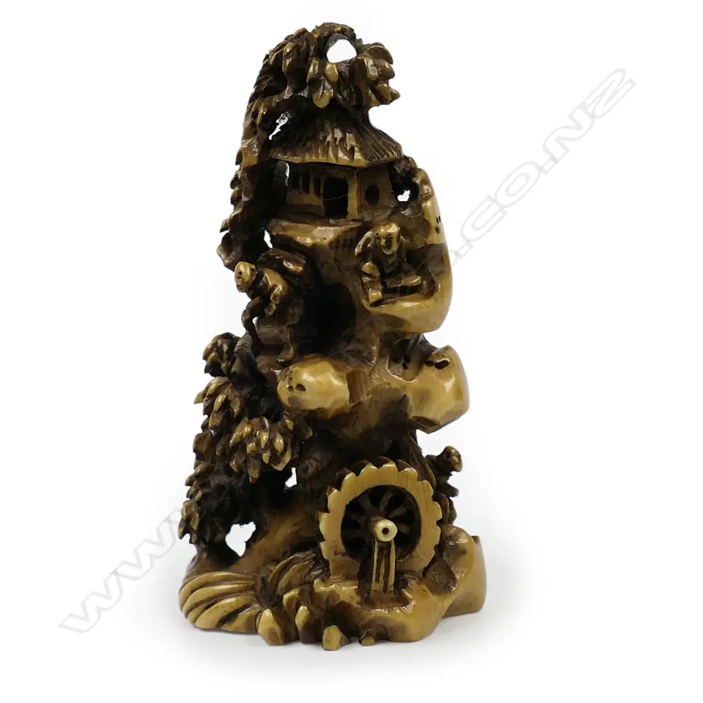 Ivory netsuke of a mountainous village scene, Image 1++