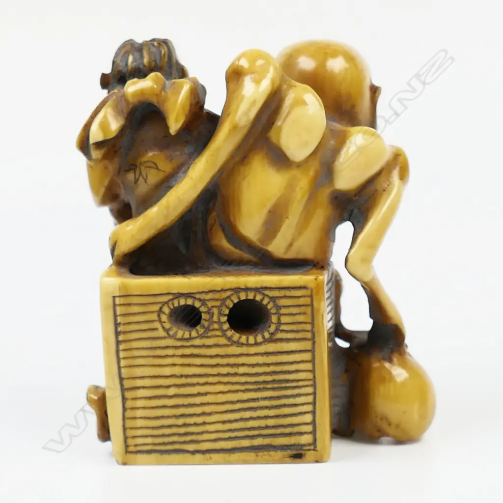 Ivory netsuke of a demon group with old woman, Image 1++
