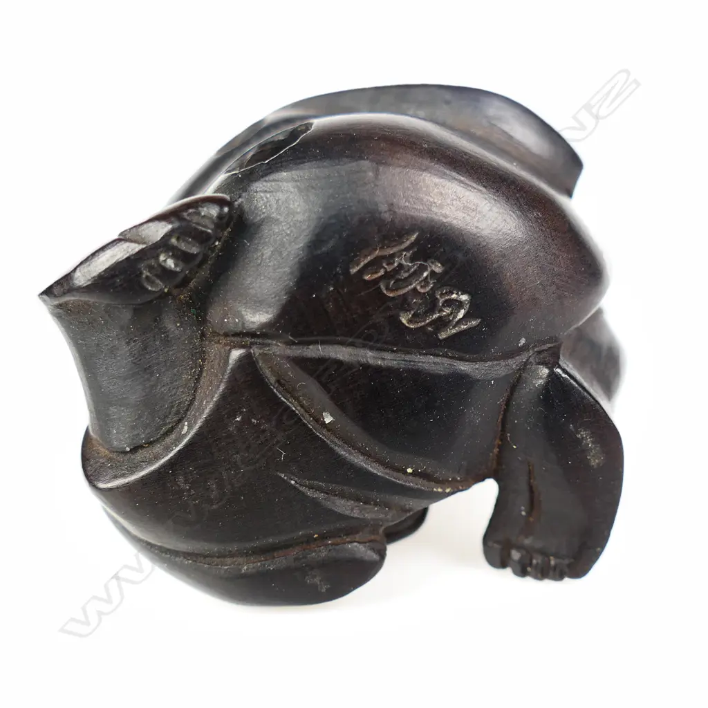 An old carved dark wood netsuke of a drunken shojo, Image 1++