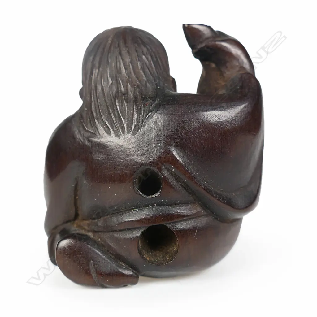An old carved dark wood netsuke of a drunken shojo, Image 1++