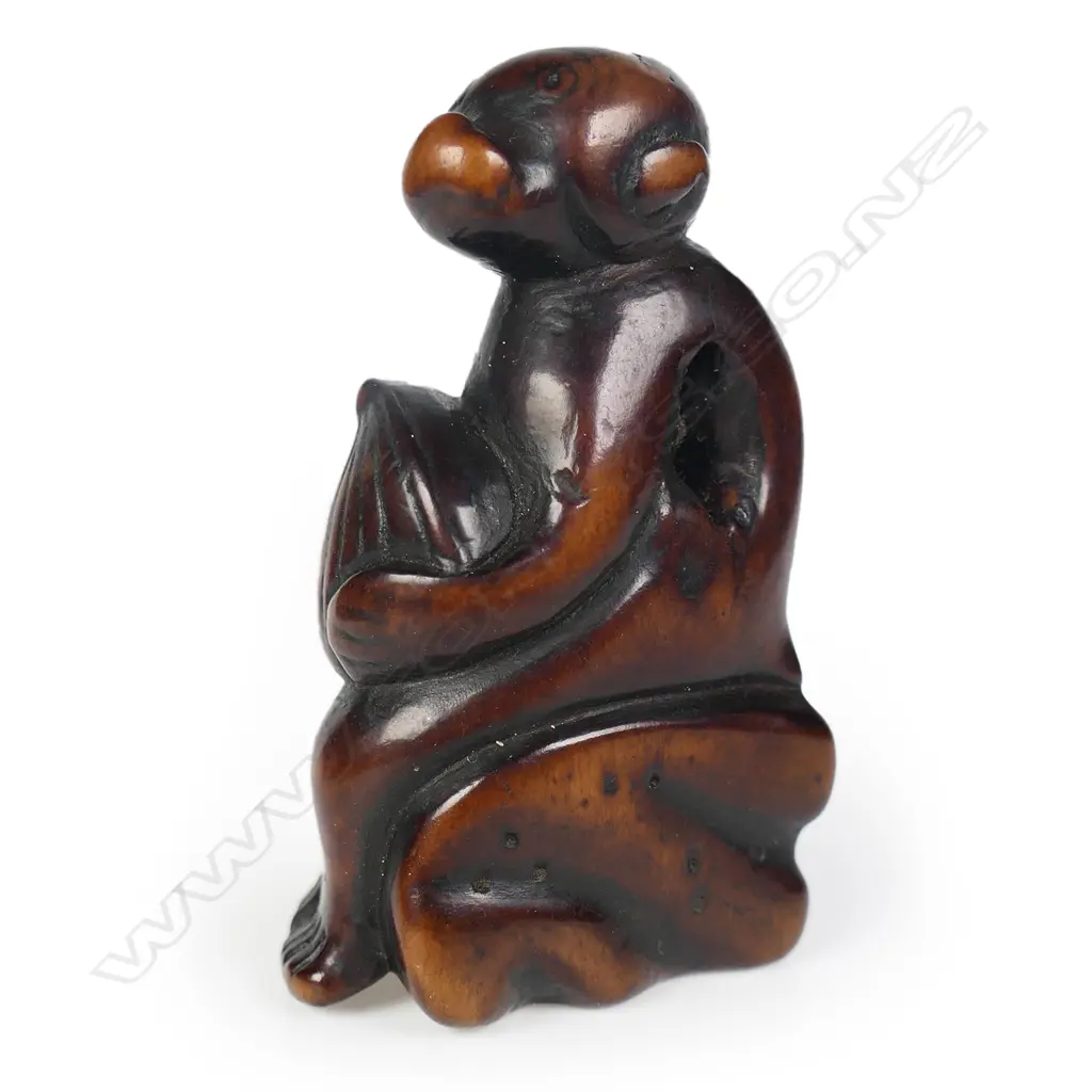 An early 19thC dark wood carved netsuke study of a monkey, Image 1++