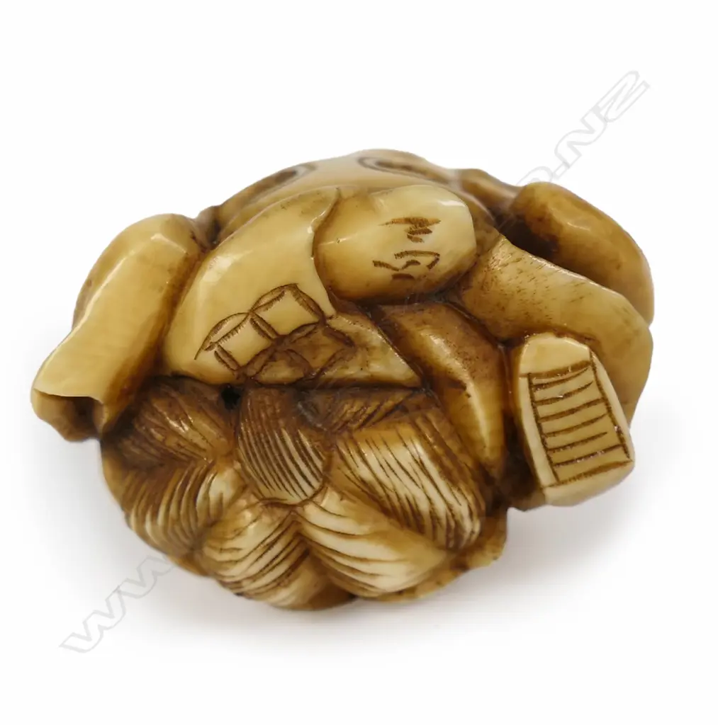 A well carved ivory netsuke study, Image 1++