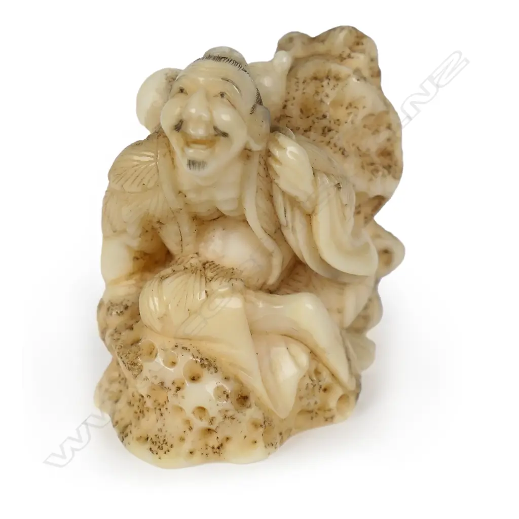 A Meiji carved walrus netsuke study of a mountain Sennin, Image 1++