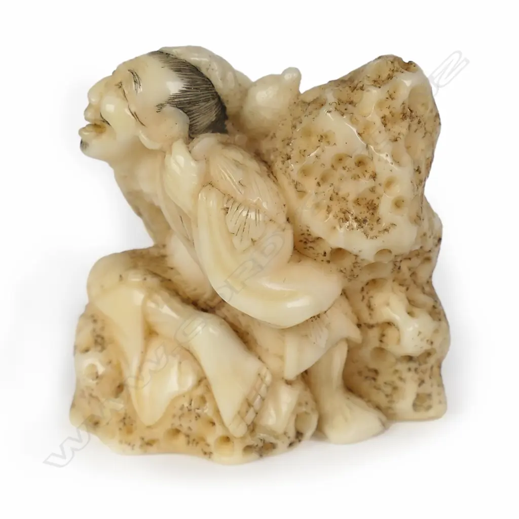 A Meiji carved walrus netsuke study of a mountain Sennin, Image 1++