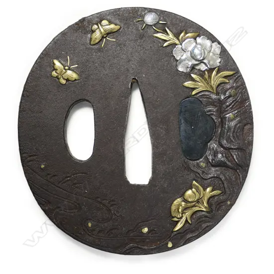 An18thc Edo period oval iron Shoami school tsuba,