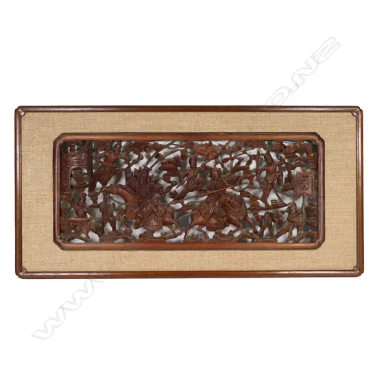 A 20thC Chinese reticulated carved and framed panel,