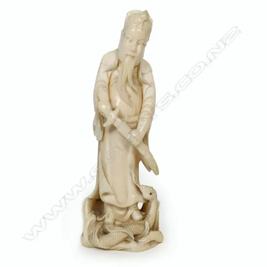 An early 20thC Chinese finely carved ivory figure of Guan Yu,