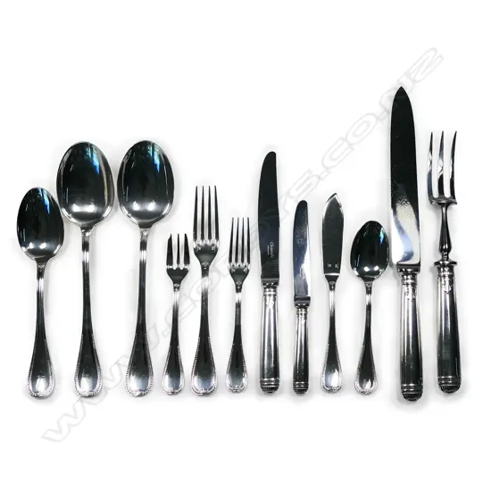 An impressive Christofle silver plate twelve place cutlery set,