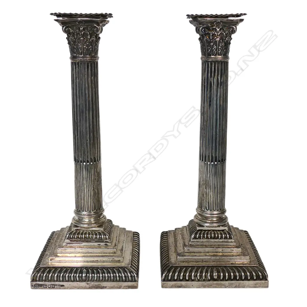 A pair of late Victorian silver candlesticks, Image 1++