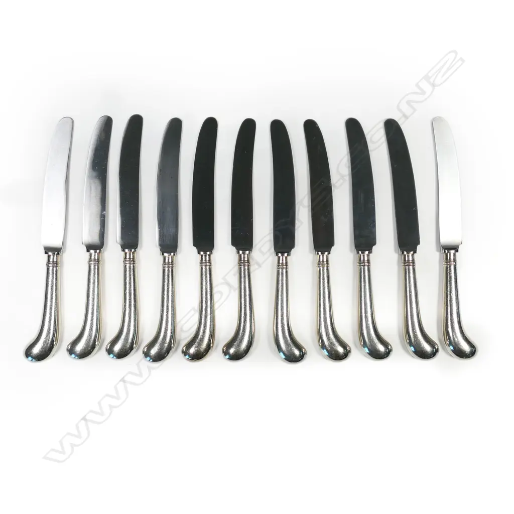 Eleven silver pistol grip luncheon knives, Image 1++