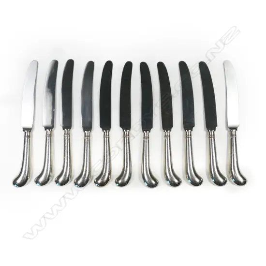 Eleven silver pistol grip luncheon knives,