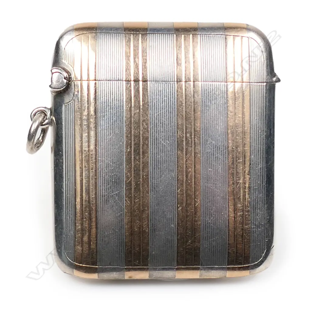 A good early 20thC silver and gold banded vesta, Image 1++