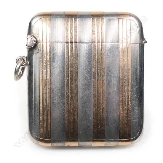 A good early 20thC silver and gold banded vesta,