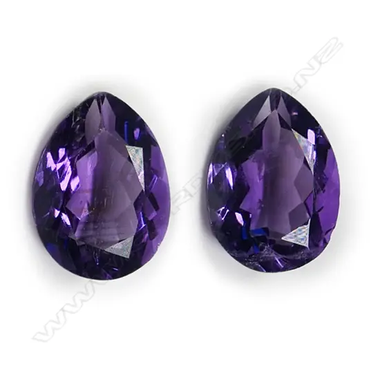 A pair of amethyst gemstones,