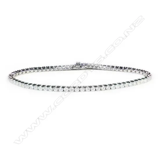 An 18ct white gold and diamond tennis bracelet,