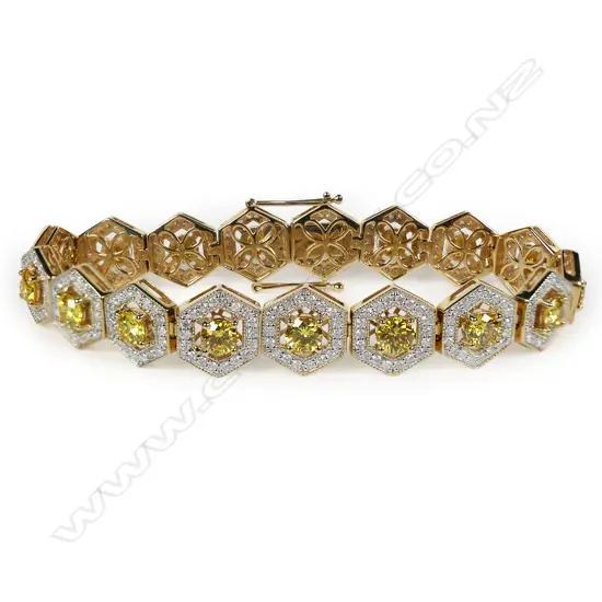 An impressive 14ct gold and diamond bracelet,