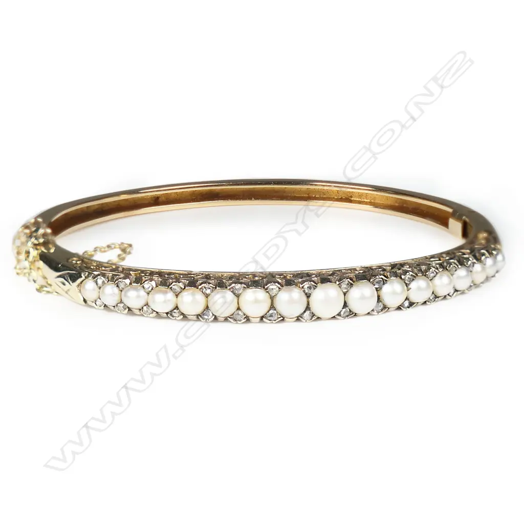 A quality c1900 15ct rose gold pearl and diamond snap bangle, Image 1++
