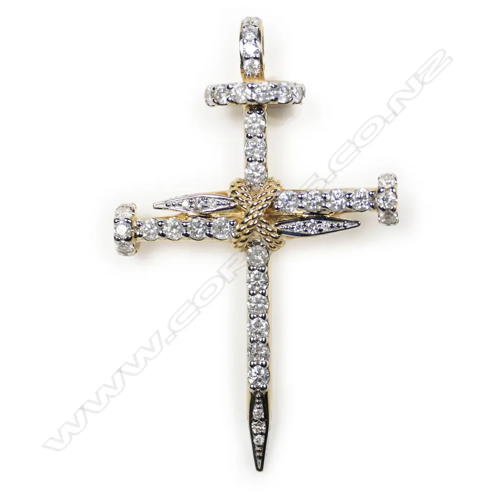 A 14ct gold and diamond cross pendant, Image 1++