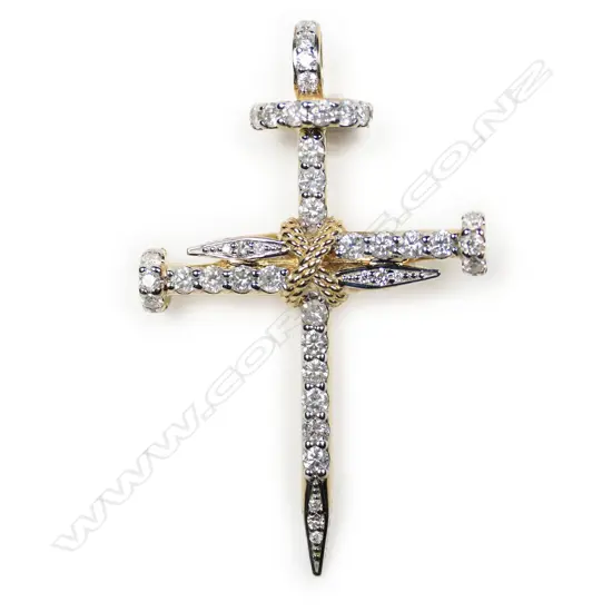 A 14ct gold and diamond cross pendant,