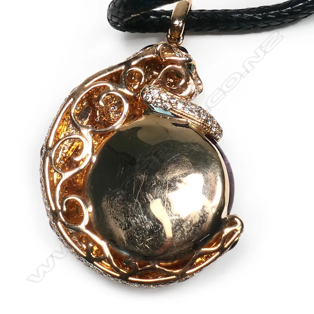 An 18ct rose gold, diamond and rubelite jaguar pendant, Image 1++