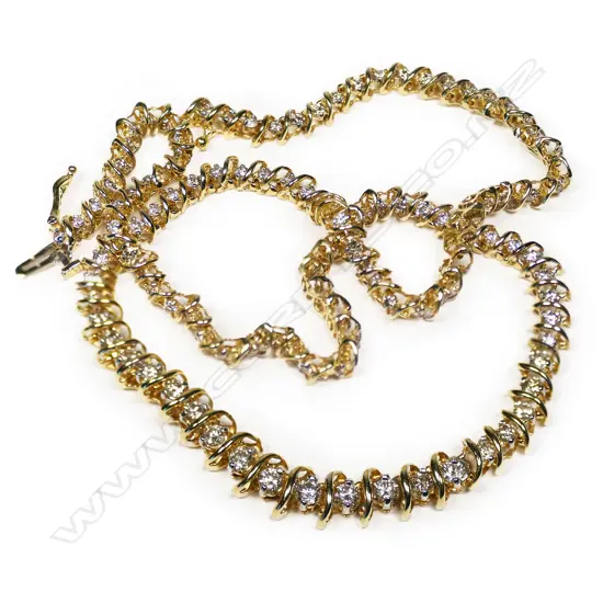 A 14ct yellow gold and diamond graduated link necklace,