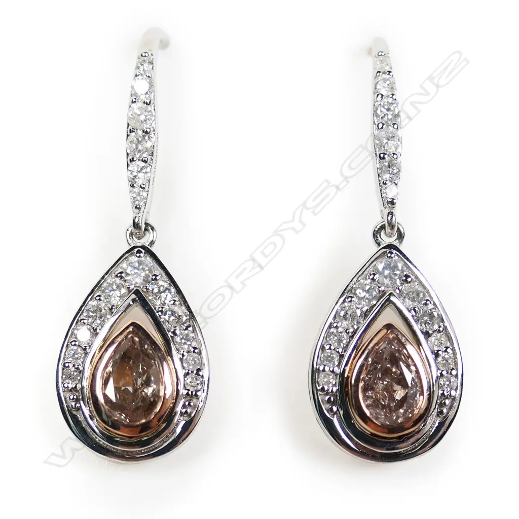 A pair of 14ct white and rose gold diamond drop earrings, Image 1++