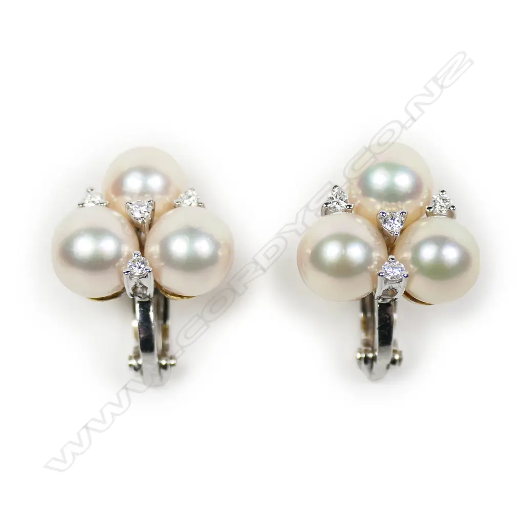 A pair of 18ct white and yellow gold pearl and diamond earrings, Image 1++