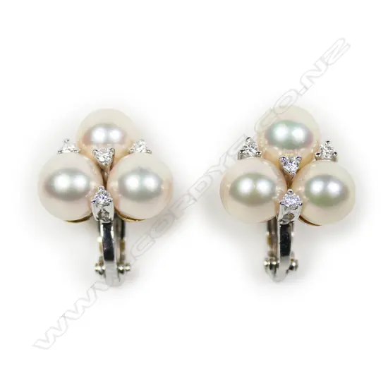 A pair of 18ct white and yellow gold pearl and diamond earrings,