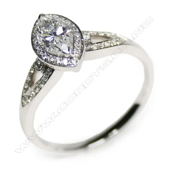 An 18ct white gold marquise diamond ring,