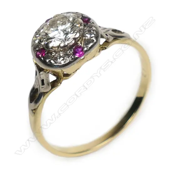 An estate 18ct gold diamond and pink sapphire ring,