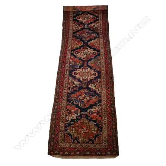 A semi antique Persian Kasak runner rug,