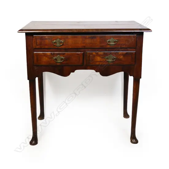 A Georgian mahogany lowboy,